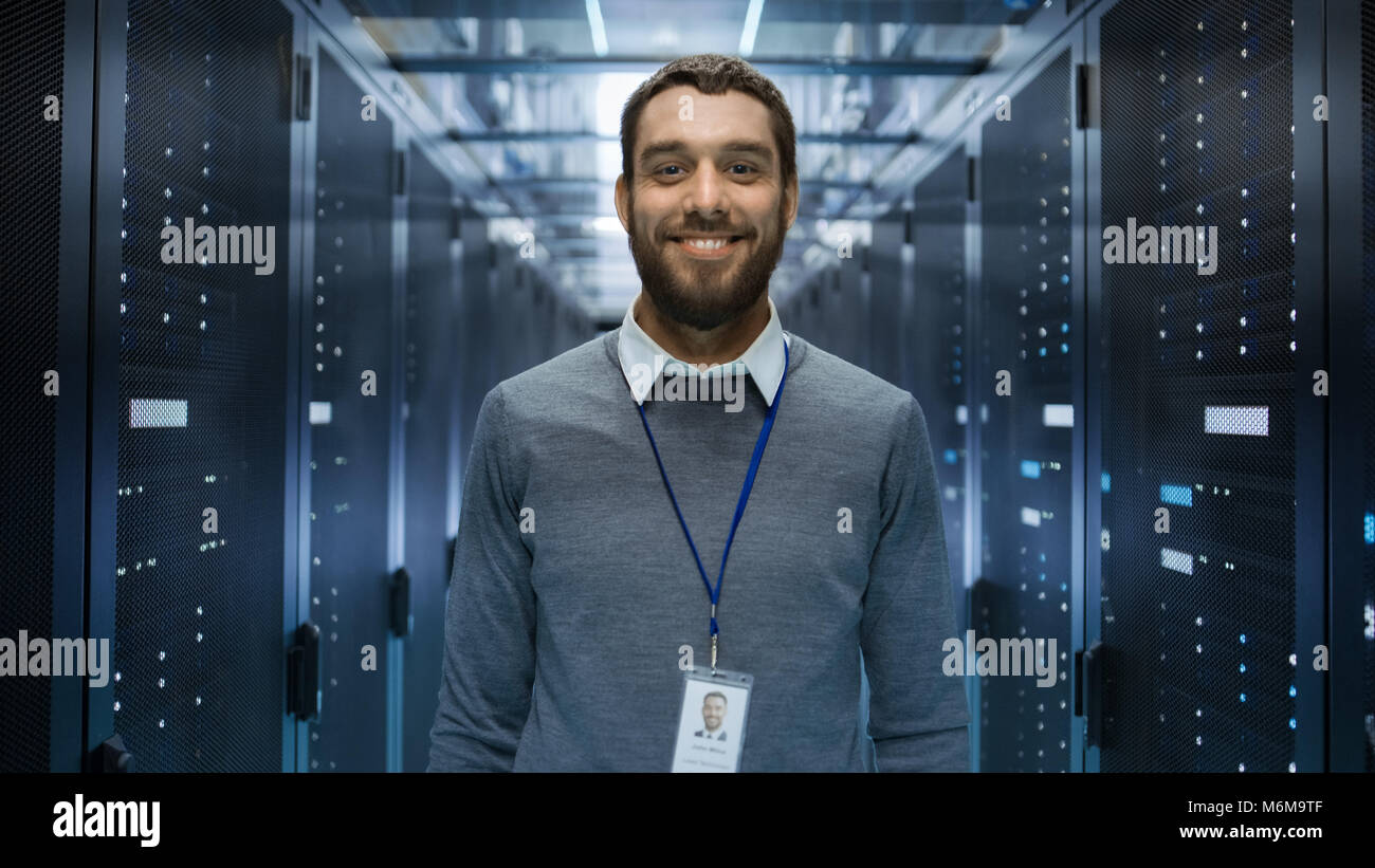 Portrait of a Curios, Positive and Smiling IT Engineer Standing in the ...