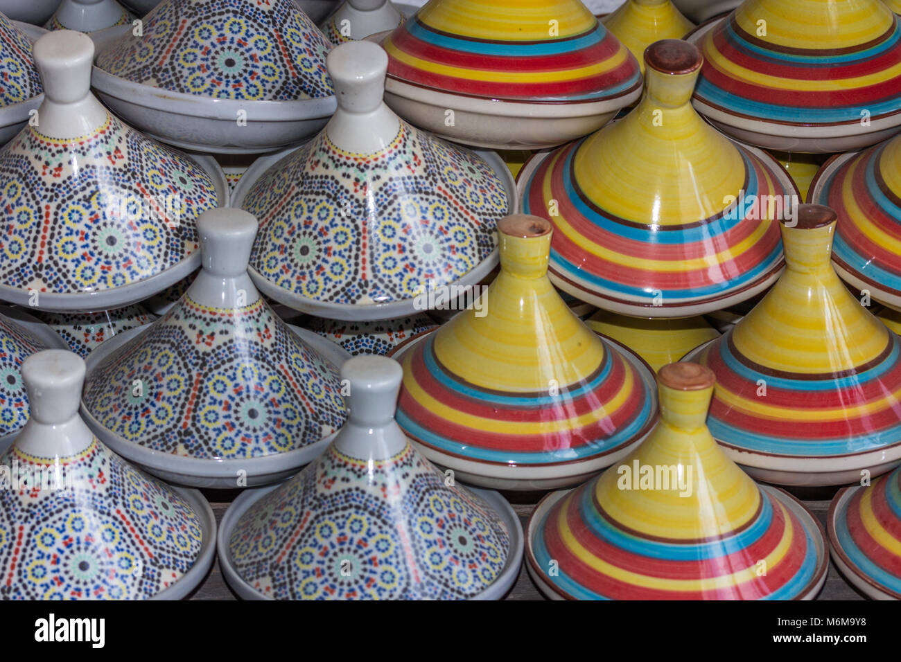 A collection of decorated tagines for sale in a souk in Res, Morocco. Stock Photo