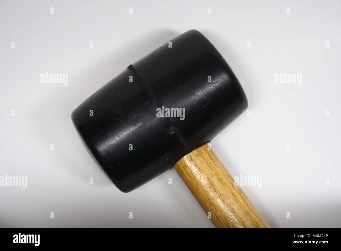 Mallet Rusted Isolated rubber mallet with wooden handle on a white background. Used ...