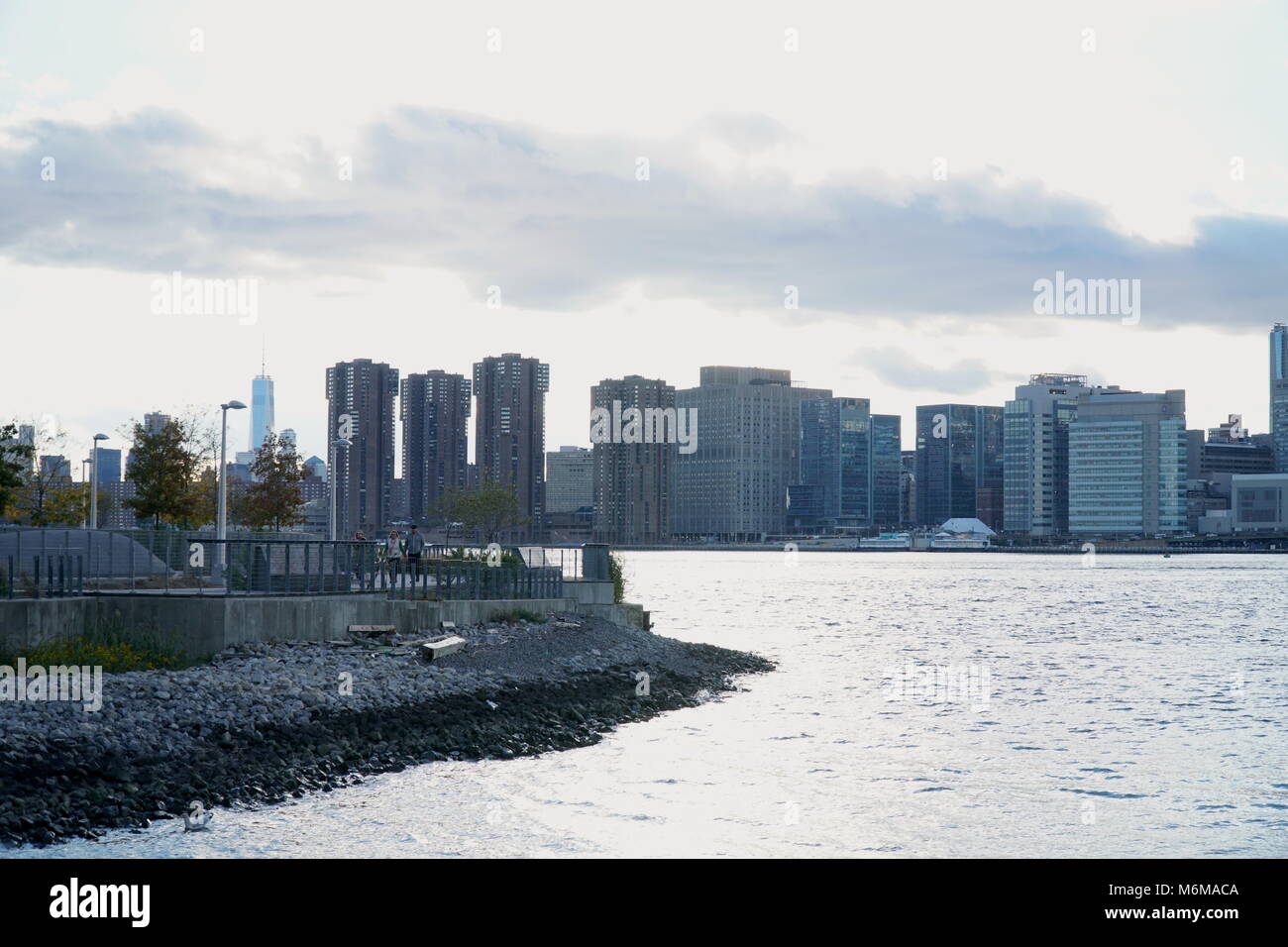 Exterior establishing shot of the New York City skyline in the evening ...