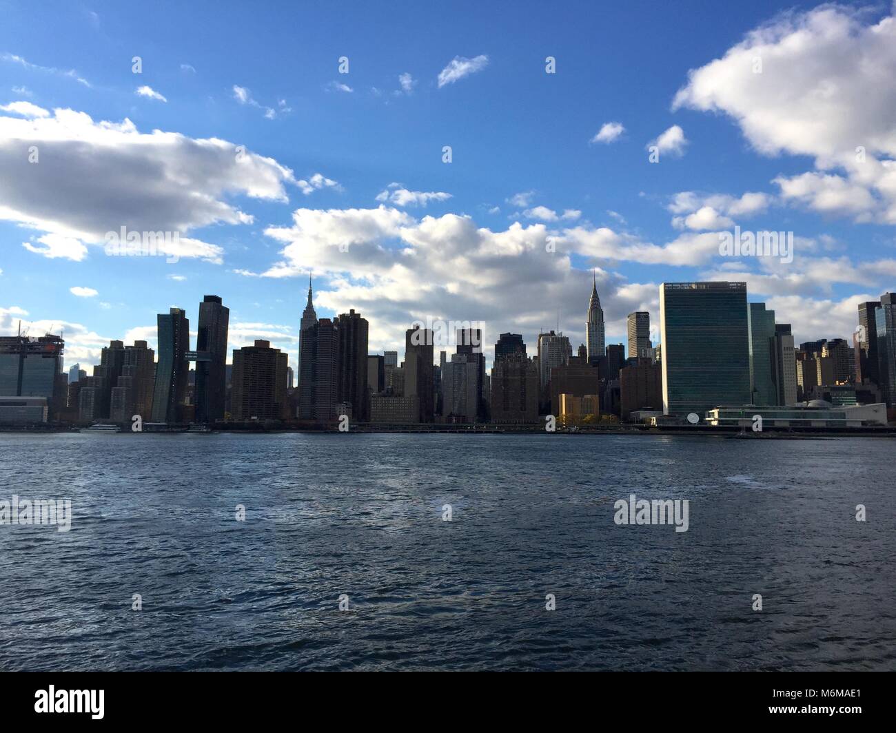 Panoramic view of the New York City Manhattan skyline at dusk. Sunset ...