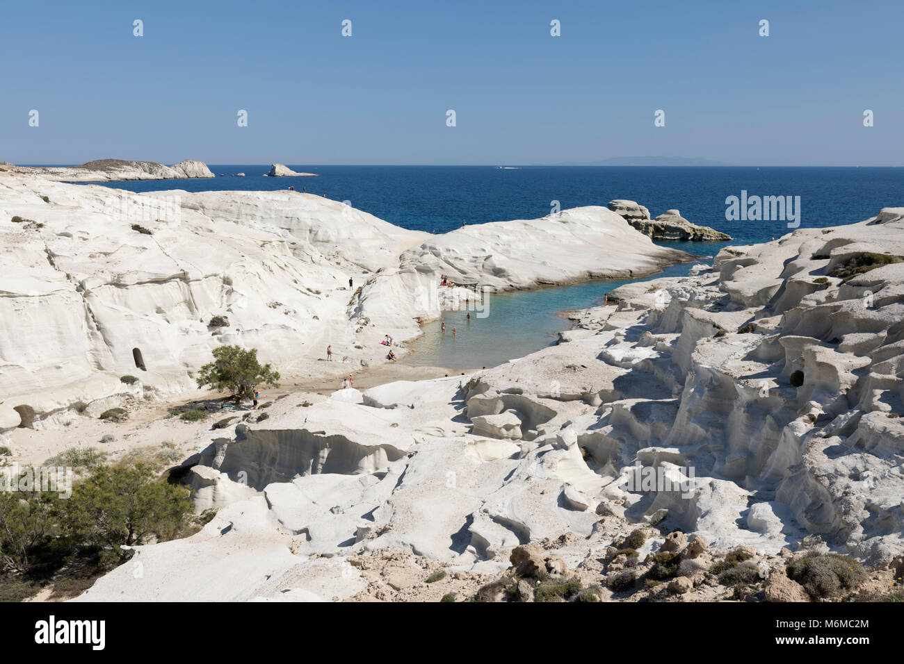 Beach and volcanic rock formations at Sarakiniko on north coast, Sarakiniko, Milos, Cyclades, Aegean Sea, Greek Islands; Greece; Europe Stock Photo