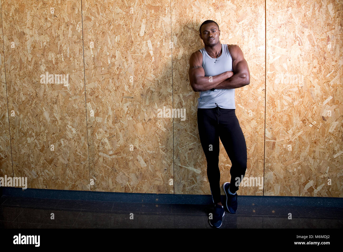 African man posing in gymnasium Stock Photo