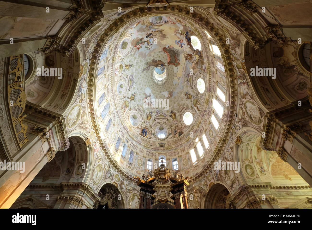 Interior of Basilica Sanctuary Regina Montis Regalis in Vicoforte Italy looking up at elliptical dome Stock Photo