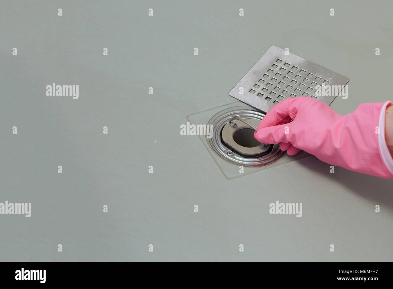 Shower drain box grate on a shower base Stock Photo Alamy