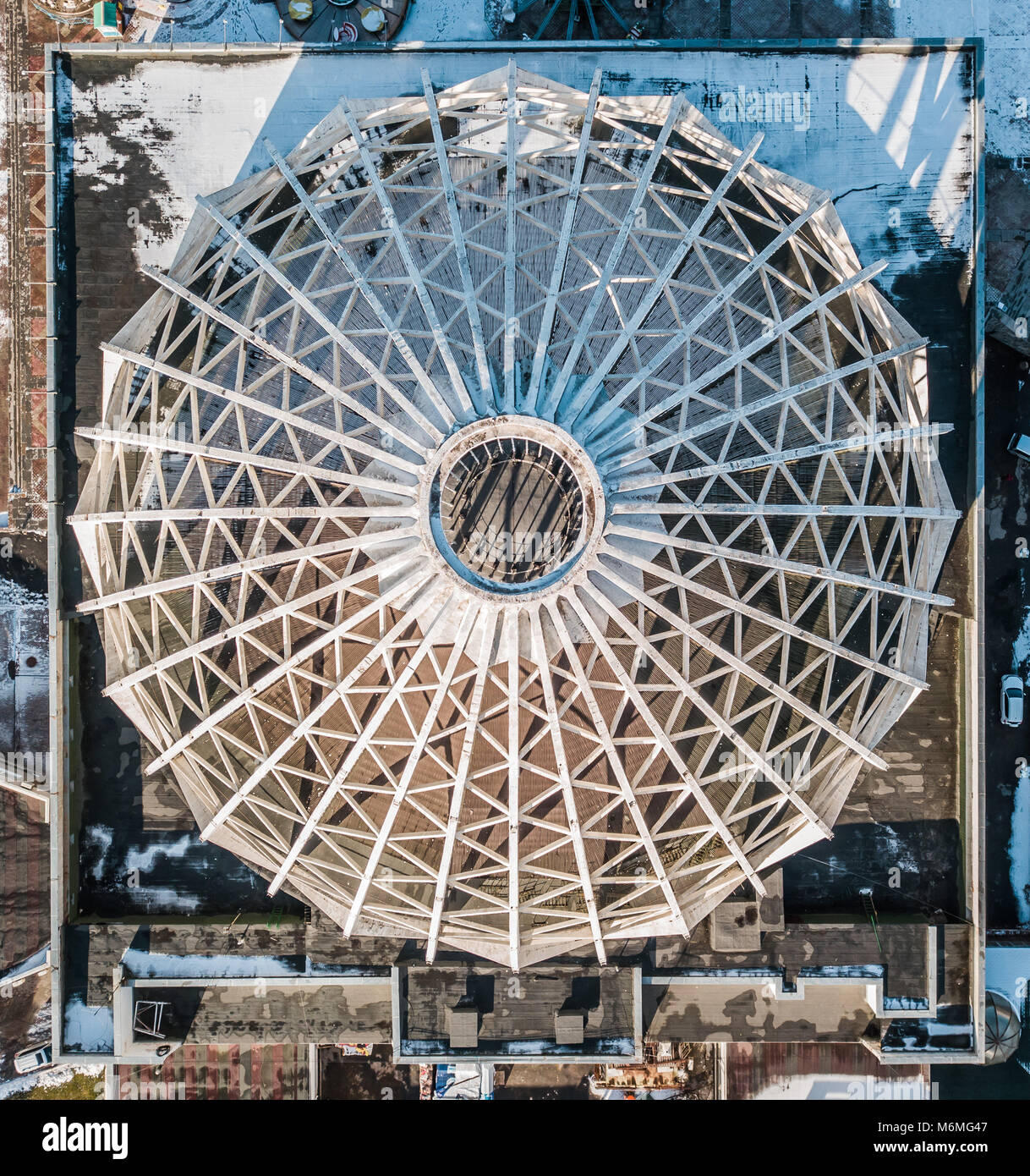Ceiling dome with snow on top. Symmetrical view of dome. Cupola. Top view of the roof dome Stock