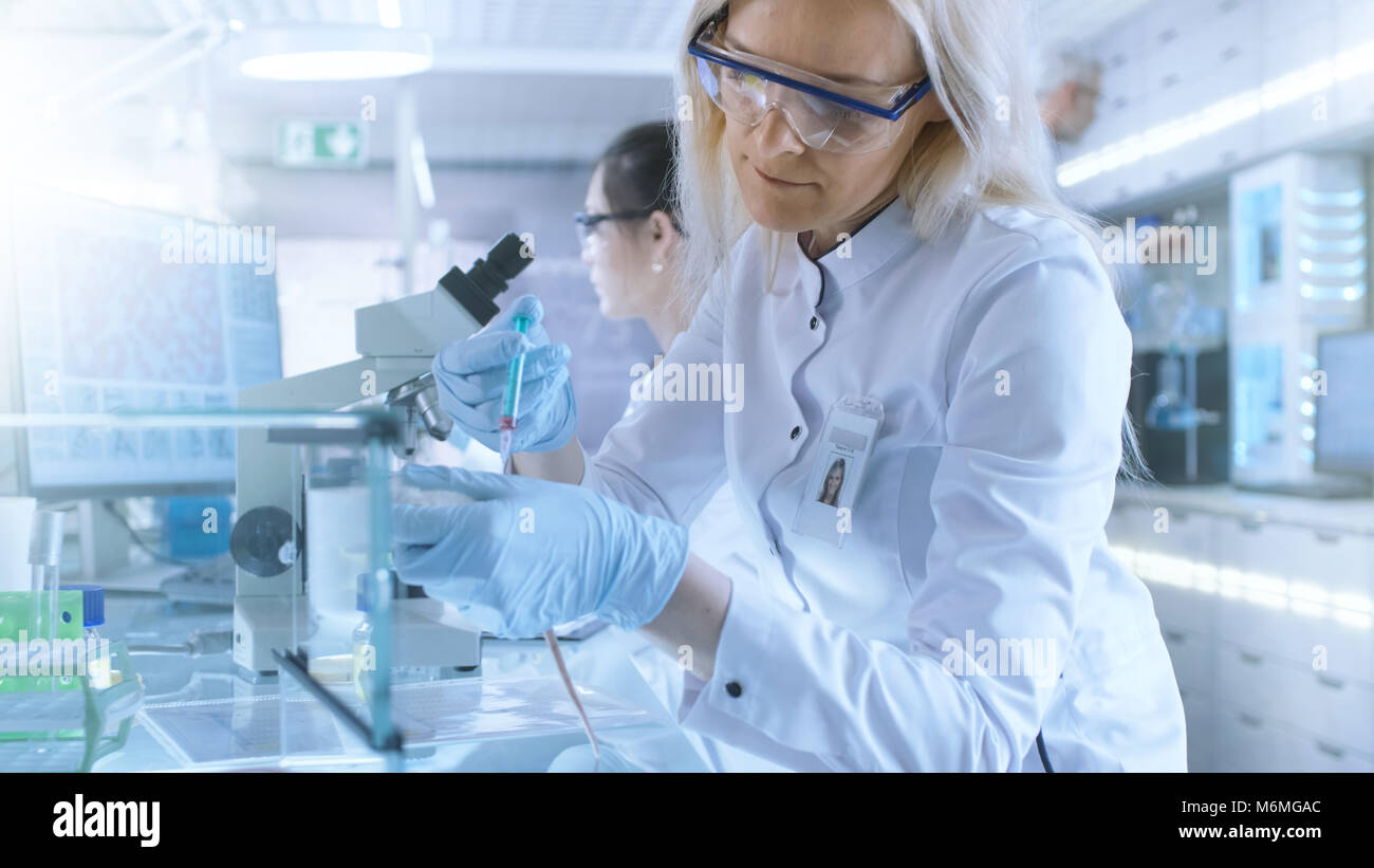 Medical Research Scientist Tests Vaccine Experimental Drug on a ...
