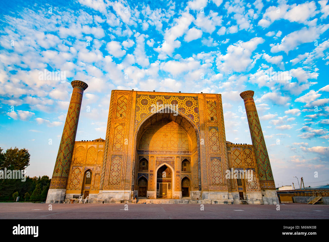 Morning clouds at the Registan, Samarkand,  Uzbekistan   Among the Word's oldest preserved medressas, Restor4ed during Soviet era Stock Photo