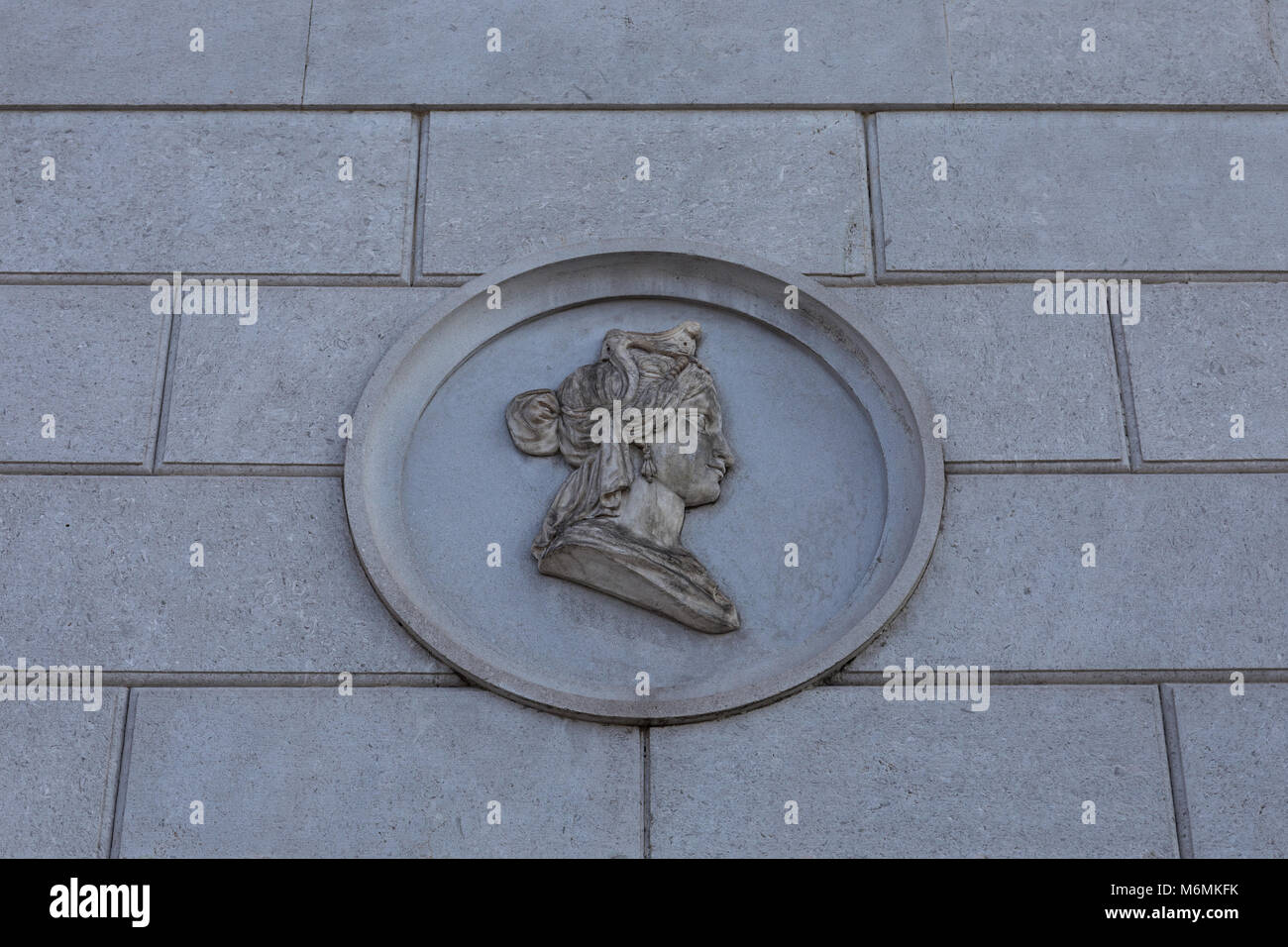 Carved stone face on wall hi-res stock photography and images - Alamy