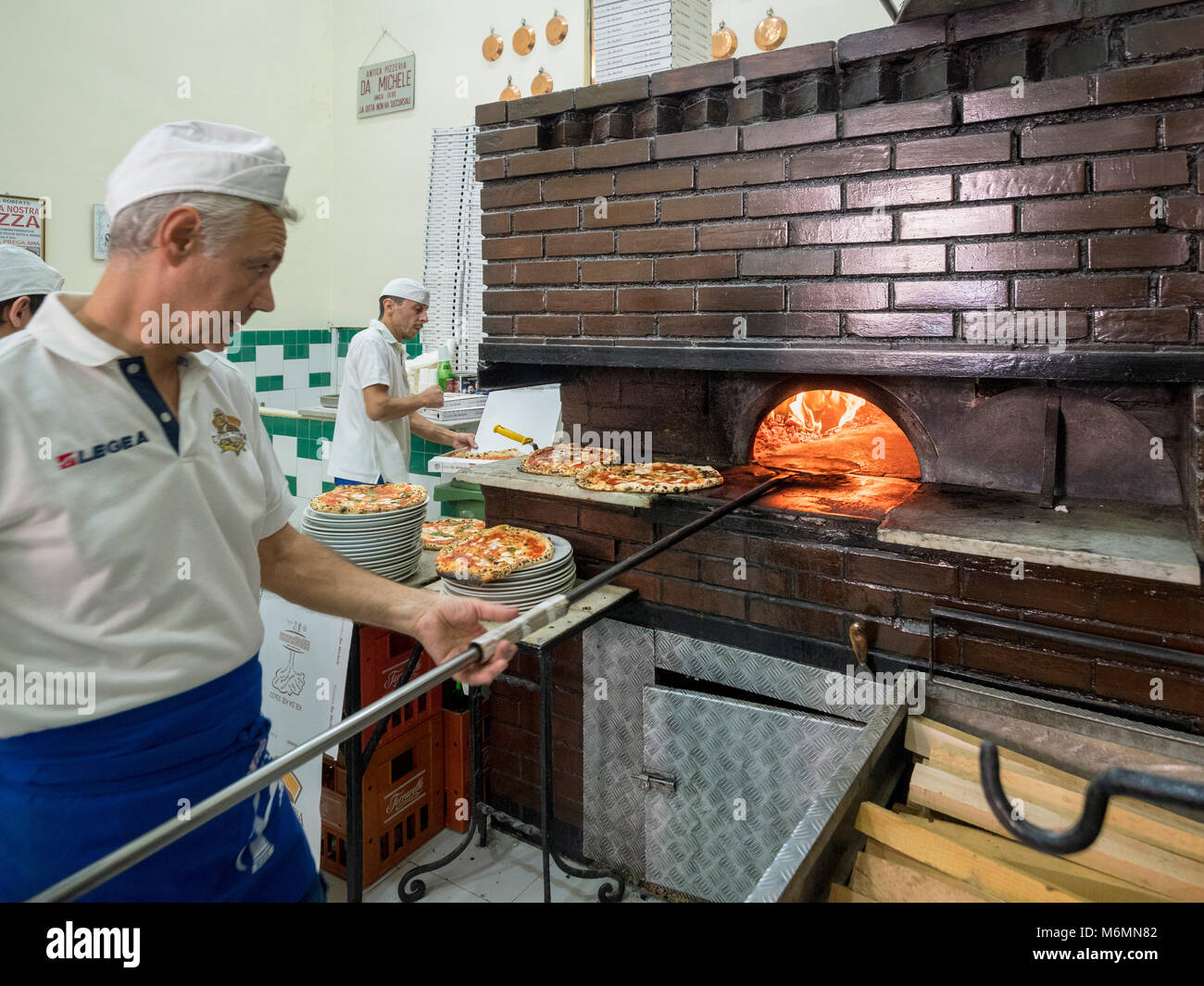Pizza chef at L'antica Pizzeria da Michele, Naples, Italy. Stock Photo