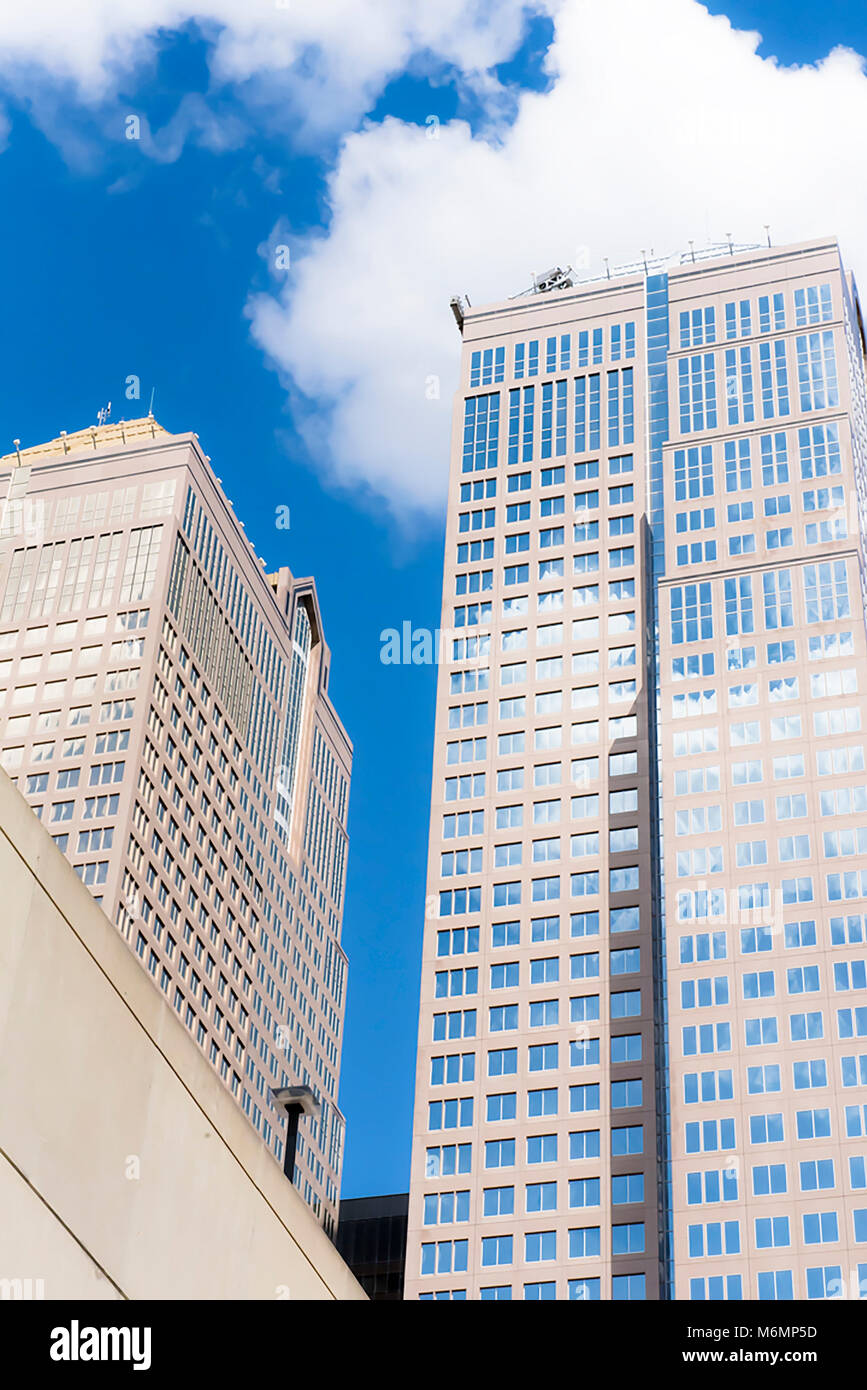 Skyscrapers against blue sky and cloud in the City of Calgary, Alberta ...