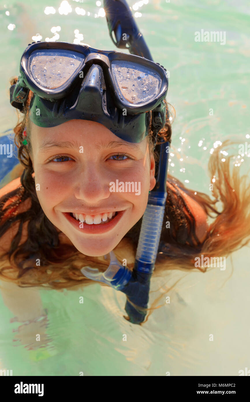 Isla Mujeres, Mexico November 4, 2016 Happy unknown girl snorkeling