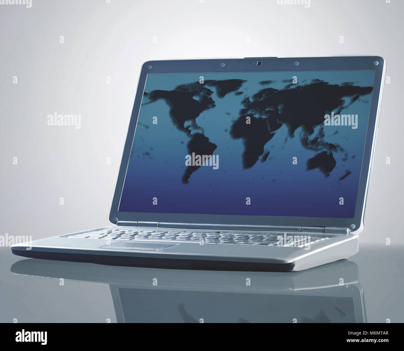 Digital interface world map graphs - Laptop With A Map Of The World M6MTAR