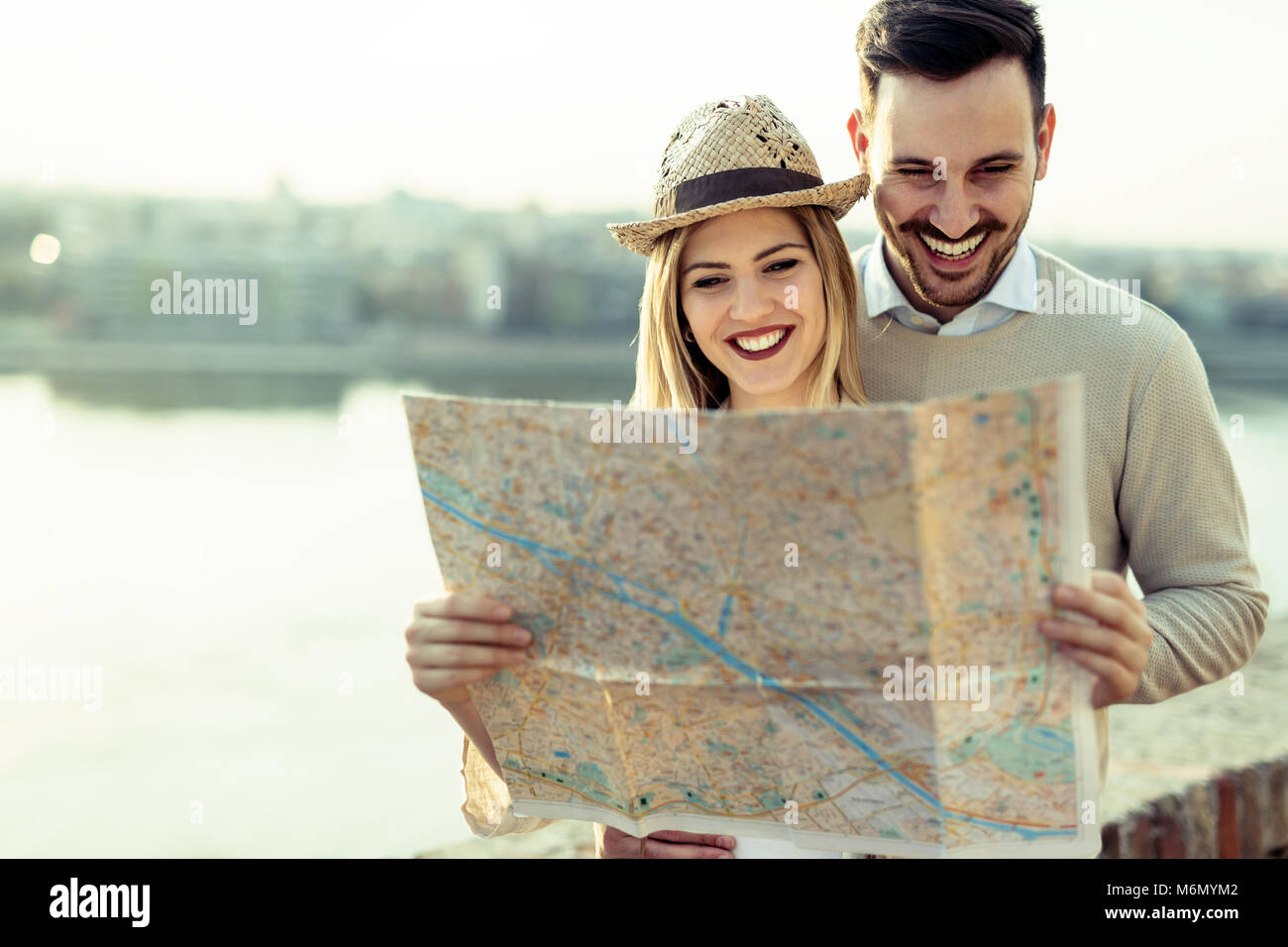 Couple happy map hi-res stock photography and images - Alamy