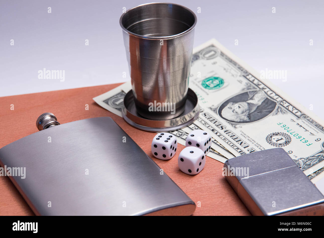 alcohol flash cigard lighter matches zippo glass dice dollar bill wood texture Stock Photo Alamy