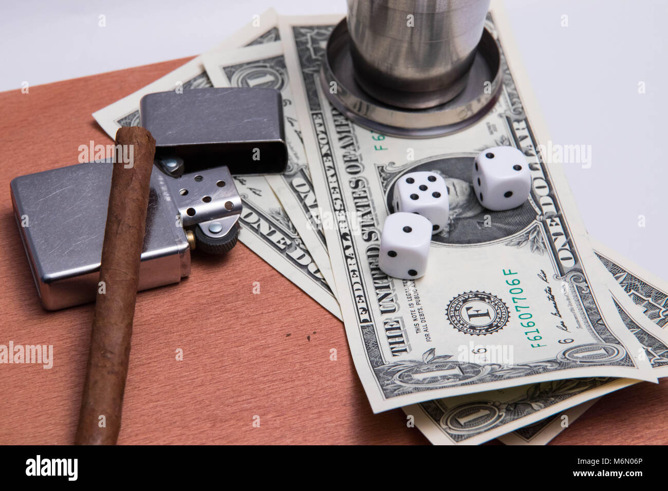 alcohol flash cigard lighter matches zippo glass dice dollar bill wood texture Stock Photo Alamy