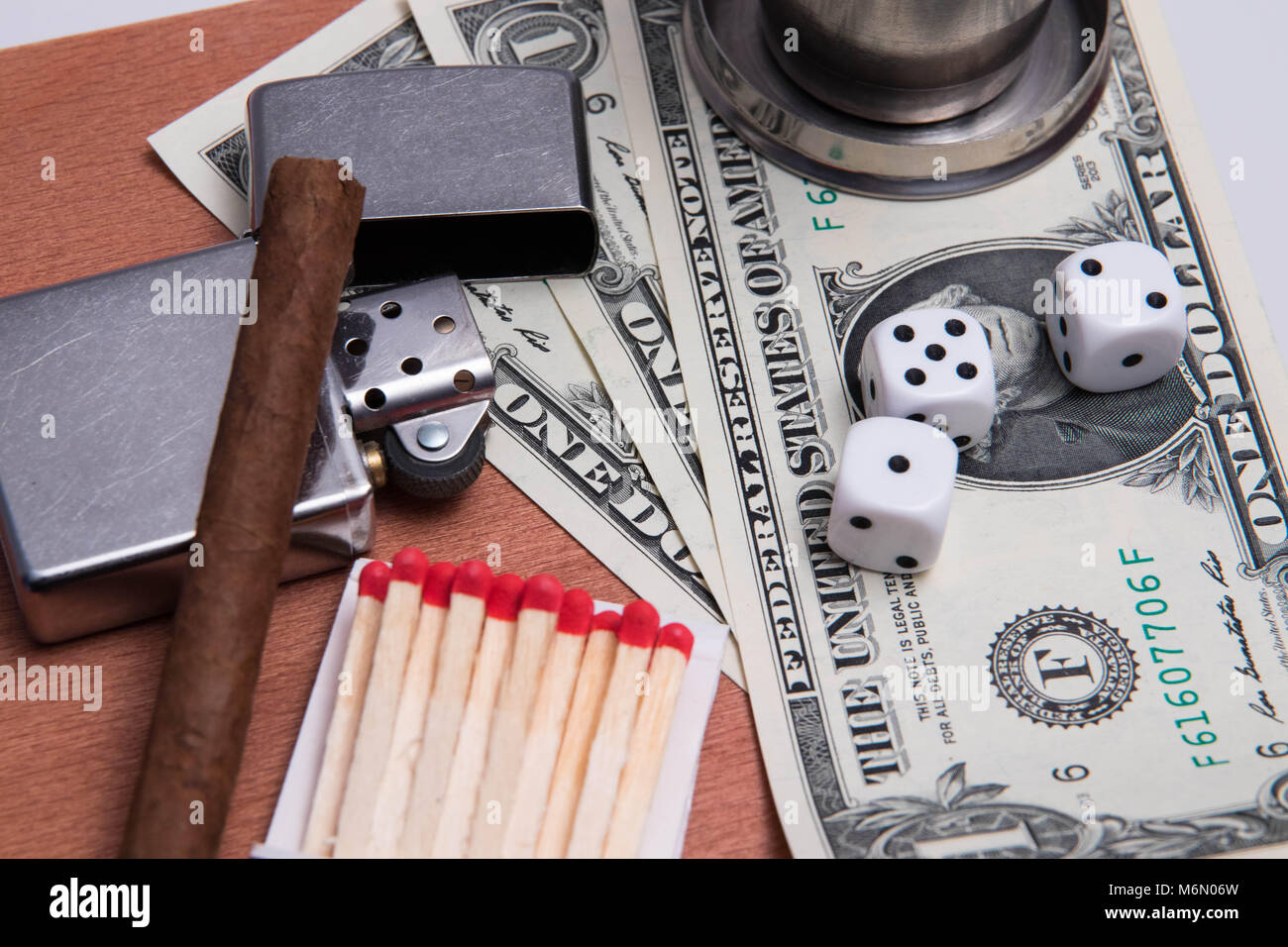 alcohol flash cigard lighter matches zippo glass dice dollar bill wood texture Stock Photo Alamy