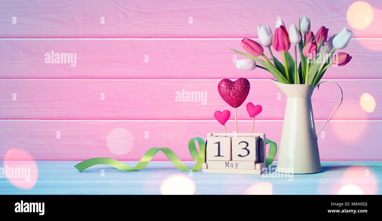 Mothers Day Greeting Card - Tulips And Calendar On Wooden Table Stock Photo