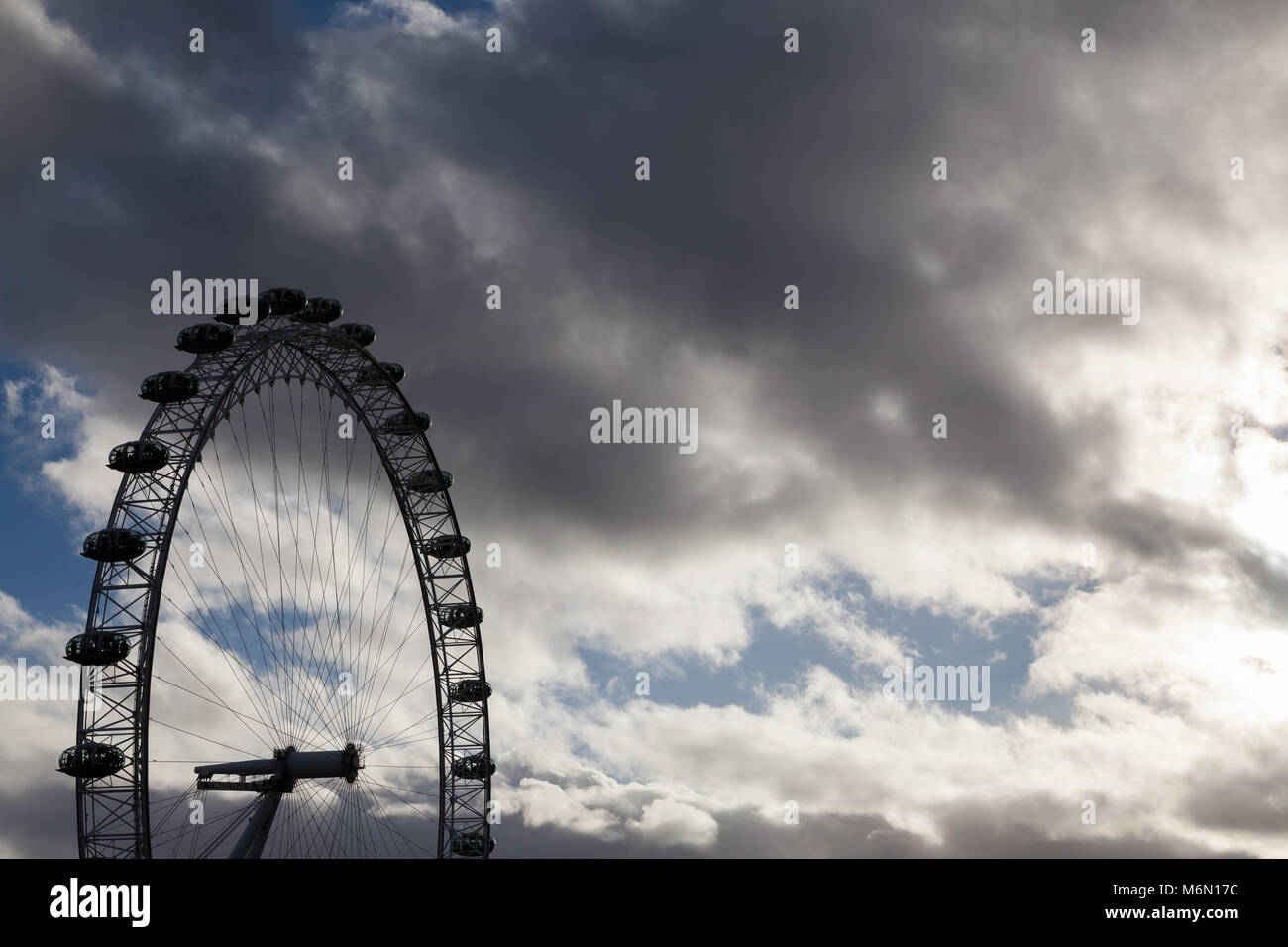 Silhouette of the London Eye in cloudy weather. Westminster, London, UK Stock Photo