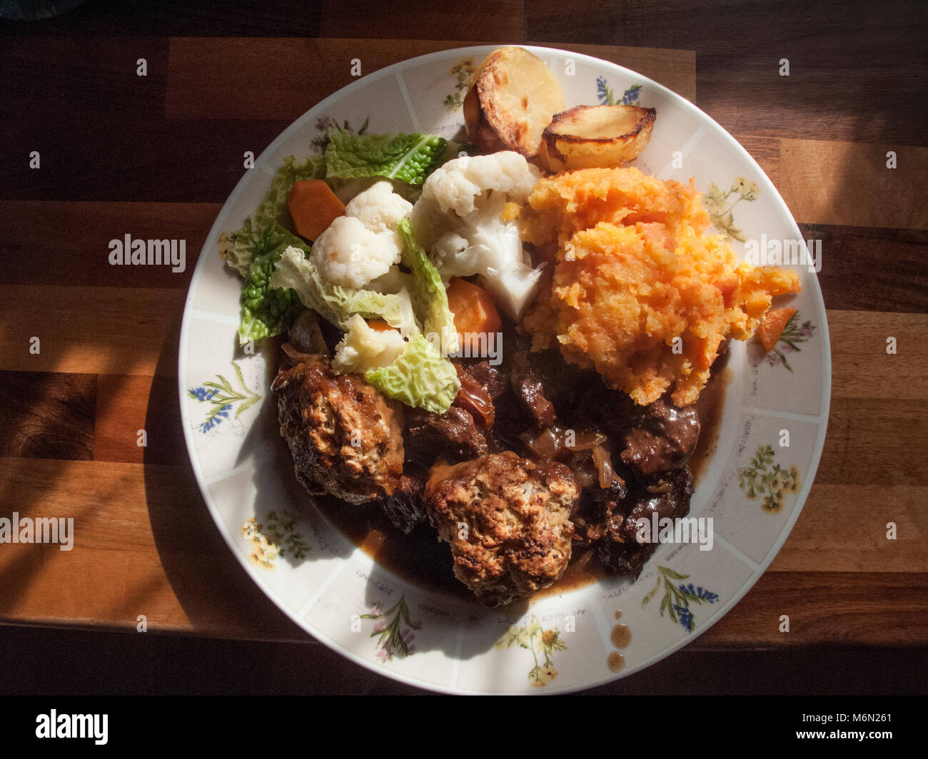 Stew and dumplings meal Stock Photo