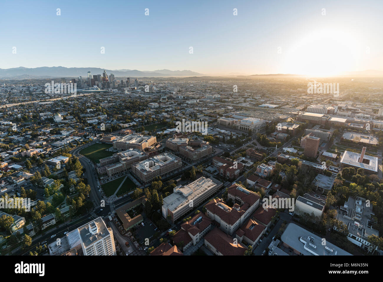 Aerial sunrise view of downtown Los Angeles, Jefferson Bl and the University of Southern California campus. Stock Photo