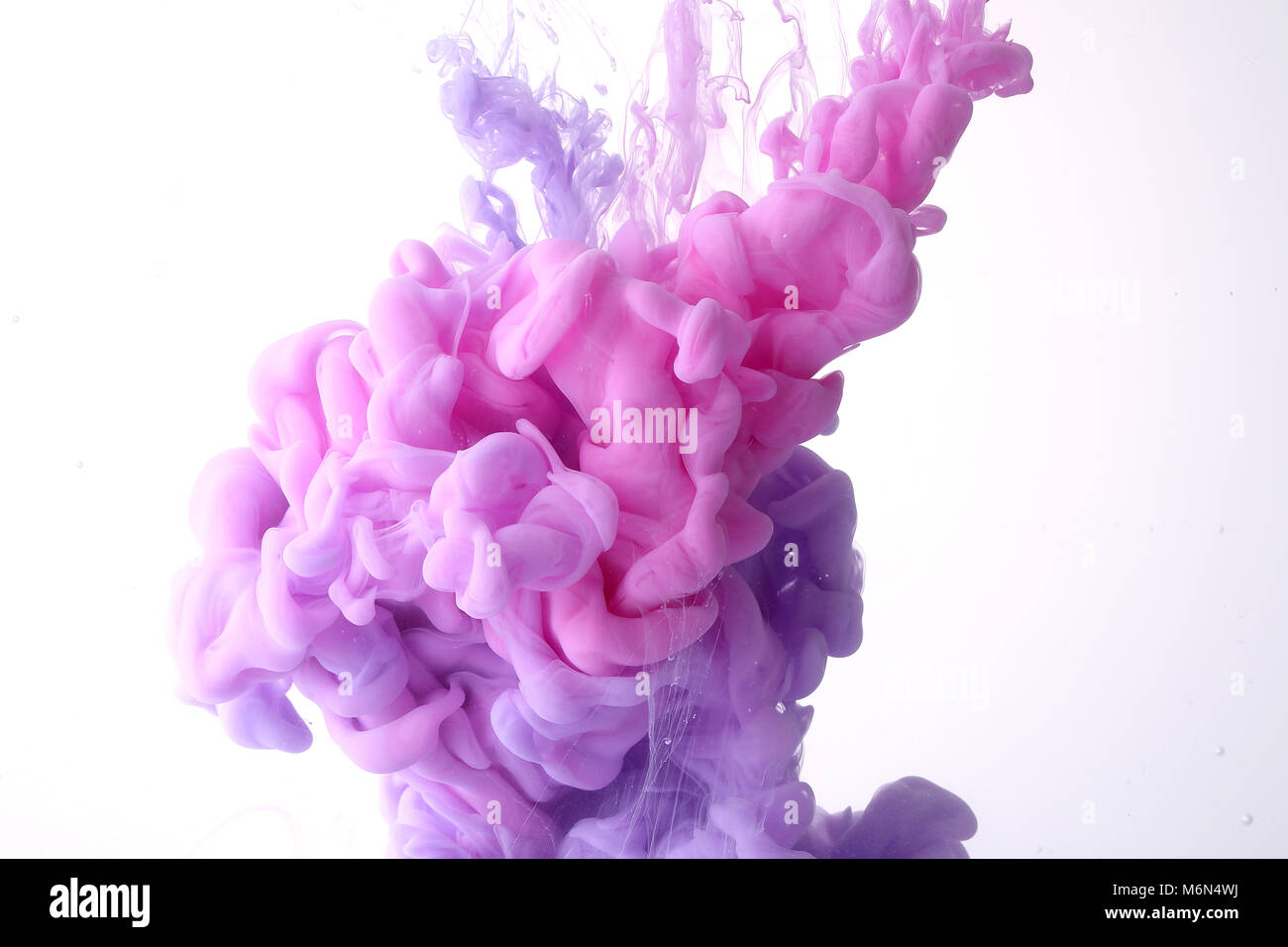 Spread, Color drop falling in water creating a Color spread. Colorful