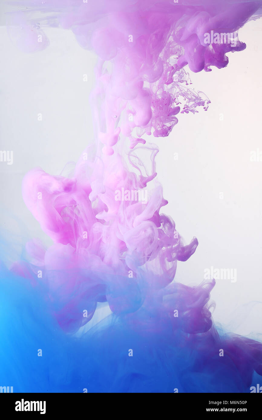 Spread, Color drop falling in water creating a Color spread. Colorful ink  drop. 076 Stock Photo - Alamy
