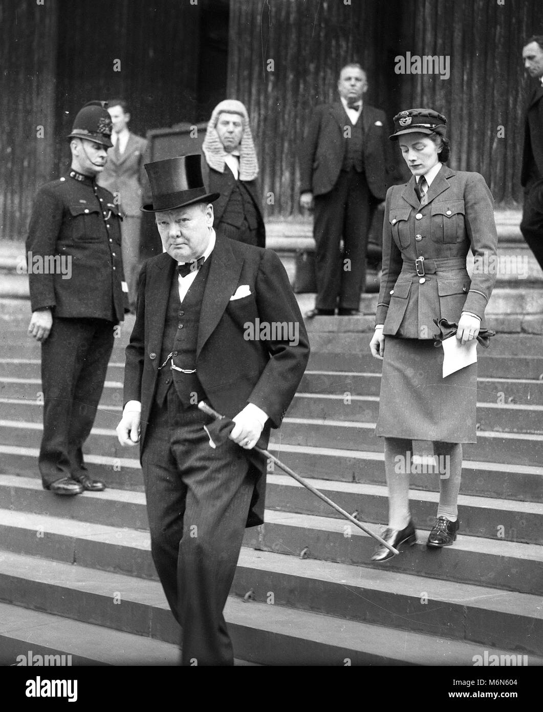 British Prime Minister, Winston Churchill with his daughter Sarah, leaving the memorial service at St Paul's Cathedral for the American President Franklin D Roosevelt. 17th April 1945: Stock Photo