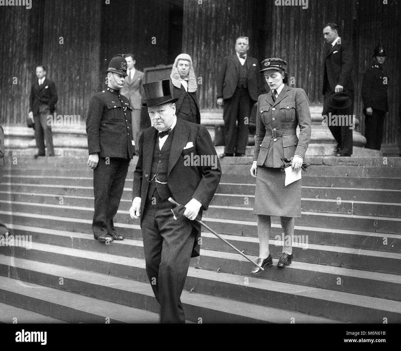 British Prime Minister, Winston Churchill with his daughter Sarah, leaving the memorial service at St Paul's Cathedral for the American President Franklin D Roosevelt. 17th April 1945: Stock Photo