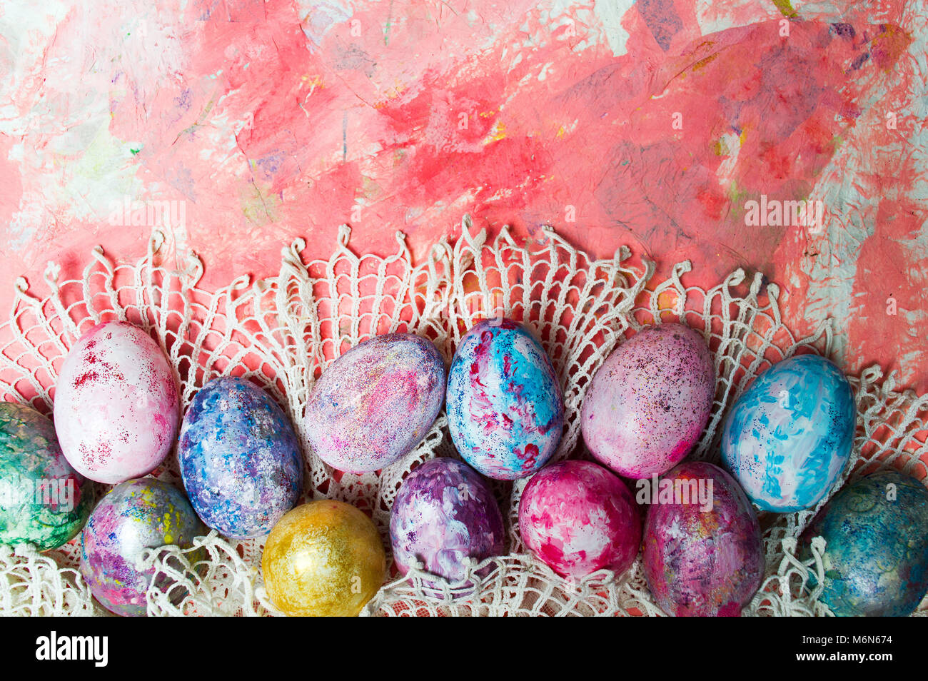 Bunch of painted Easter eggs on a table top view Stock Photo - Alamy