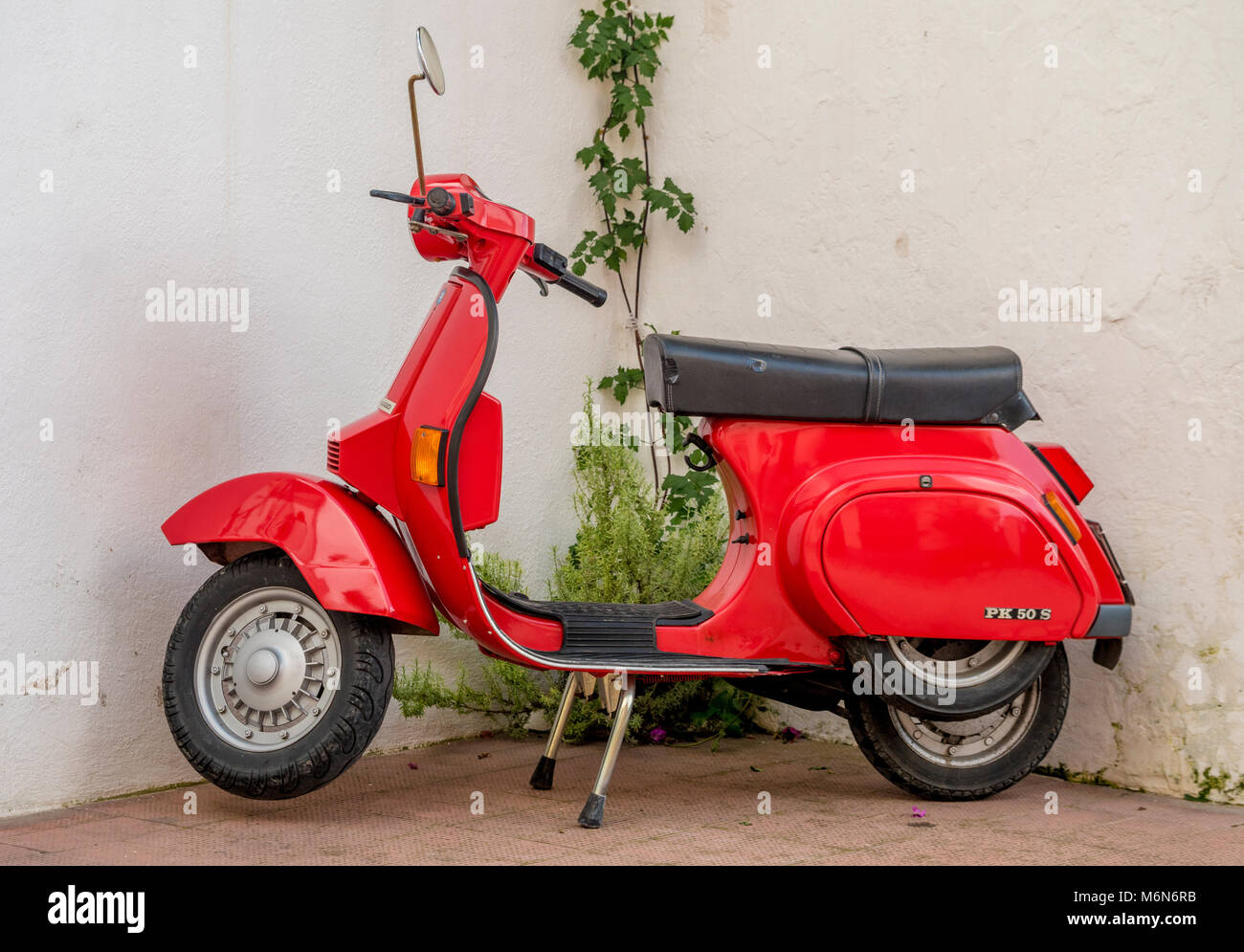 Red Italian Vespa PK 50 S moped Stock Photo