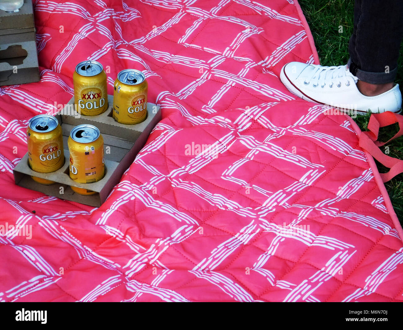 Castlemaine XXXX beer cans on picnic blanket Stock Photo Alamy
