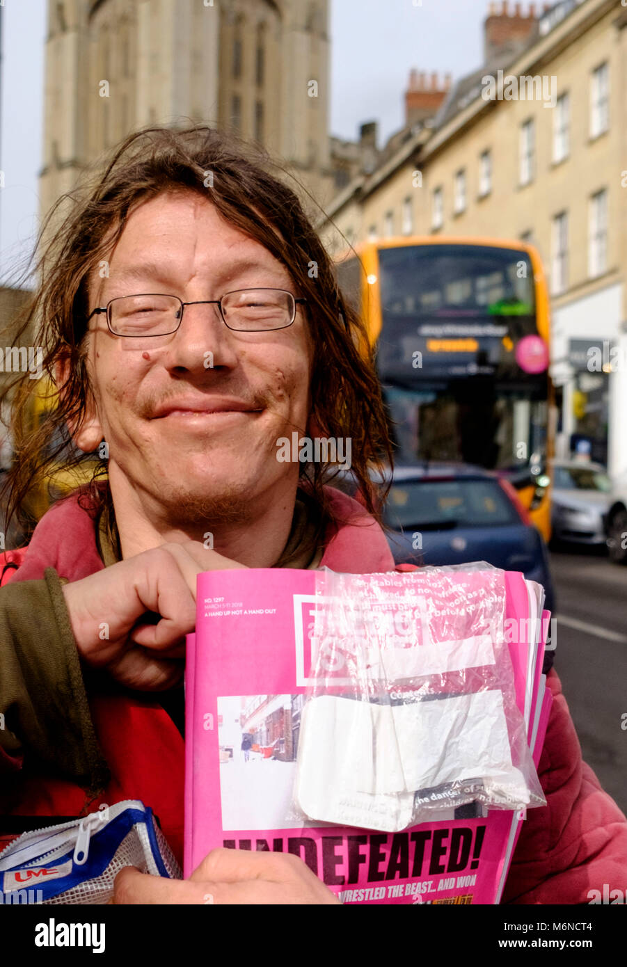Bristol, UK. 5th March, 2018. Jack Richardson the popular Bristol Big Issue seller has gone contactless. The gift of a used smart phone and the discounted purchase of a card reader had led to increased sales. Jack says his health has made other jobs difficult for him but he loves selling the Big Issue. Going contactless is a smart move as less people carry cash. ©JMF News/Alamy Live News Stock Photo