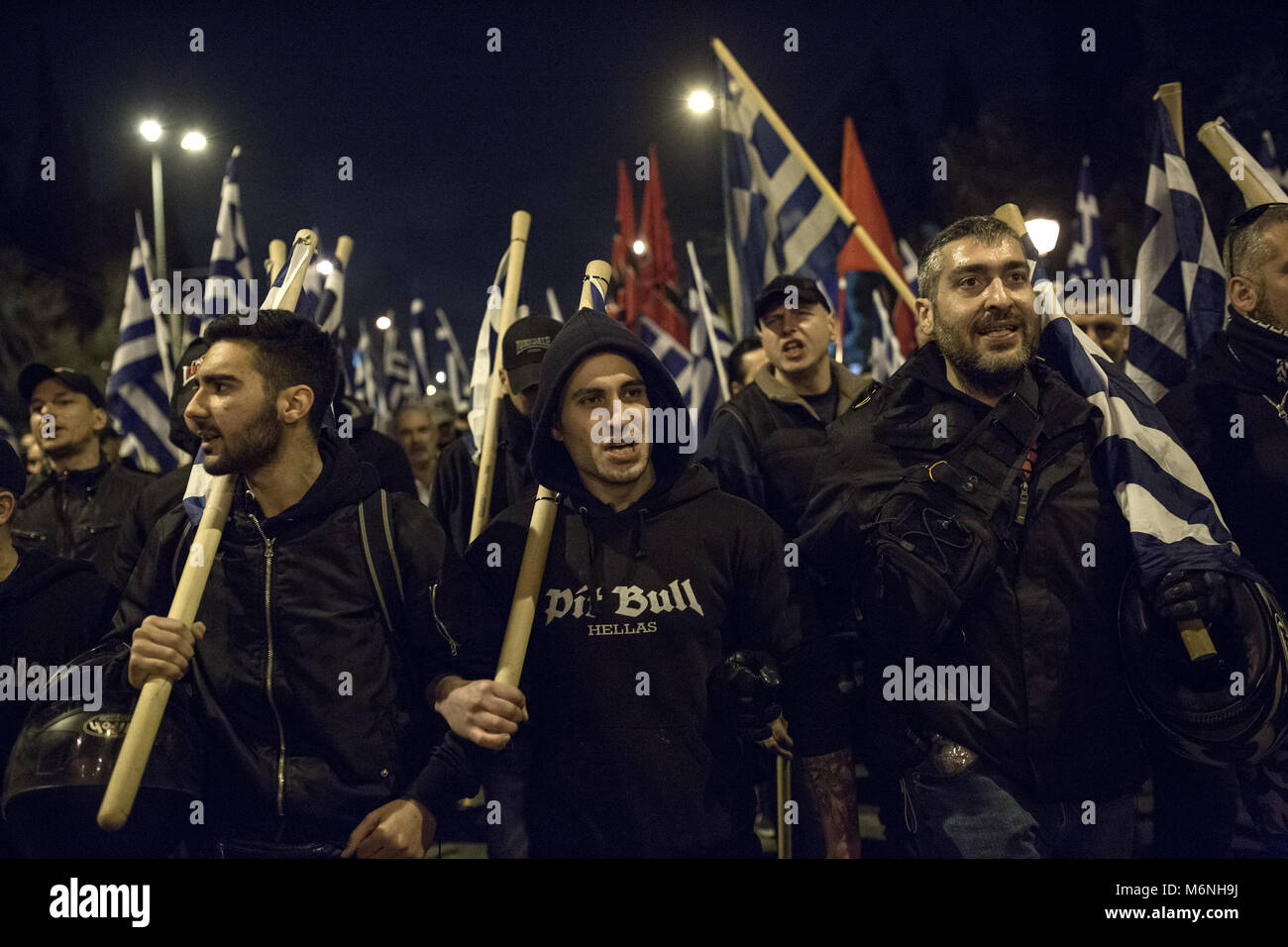 Athens, Greece. 05 March 2018, : Supporters of the Greek far-right party 'Golden Dawn' protest against the Turkish policy with Greek flags while marching to the Turkish Embassy. Amongst others, they protest against the arrest of two Greek soldiers, who crossed the border to Turkey on 1 March and stated that they got lost. A Turkish court put them into custody on suspicion of attempted military espionage on 2 March. Photo: Socrates Baltagiannis/dpa Credit: dpa picture alliance/Alamy Live News Stock Photo