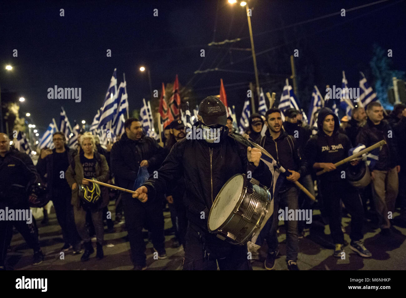 Athens, Greece. 05 March 2018, : Supporters of the Greek far-right party 'Golden Dawn' protest against the Turkish policy with Greek flags. Amongst others, they protest against the arrest of two Greek soldiers, who crossed the border to Turkey on 1 March and stated that they got lost. A Turkish court put them into custody on suspicion of attempted military espionage on 2 March. Photo: Socrates Baltagiannis/dpa Credit: dpa picture alliance/Alamy Live News Stock Photo