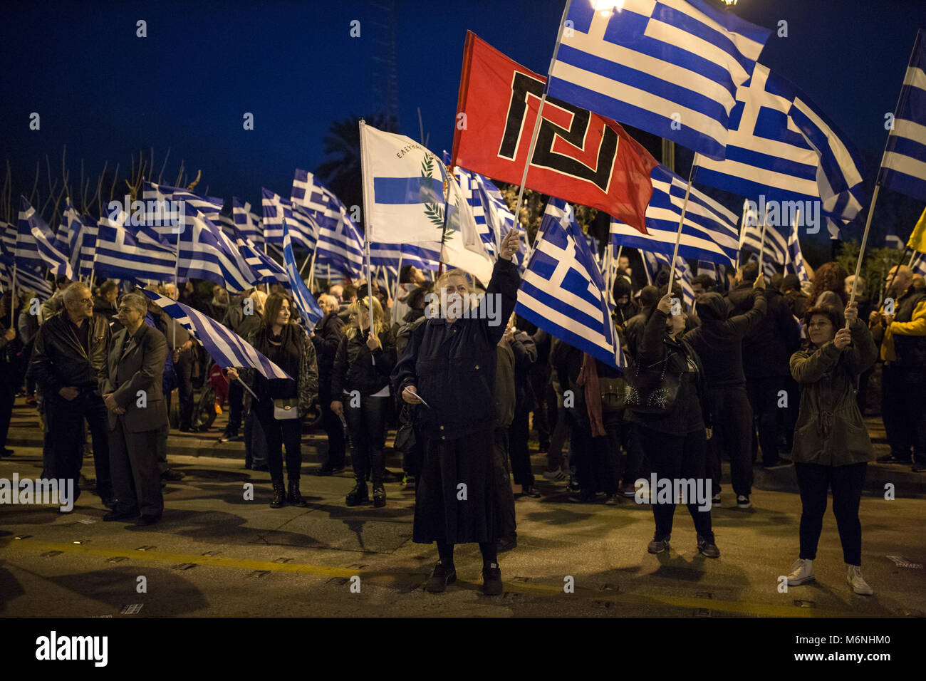 Athens, Greece. 05 March 2018, : Supporters of the Greek far-right party 'Golden Dawn' protest with Greek flags and a flag of their party (red-black) against the Turkish policy. Amongst others, they protest against the arrest of two Greek soldiers, who crossed the border to Turkey on 1 March and stated that they got lost. A Turkish court put them into custody on suspicion of attempted military espionage on 2 March. Photo: Socrates Baltagiannis/dpa Credit: dpa picture alliance/Alamy Live News Stock Photo