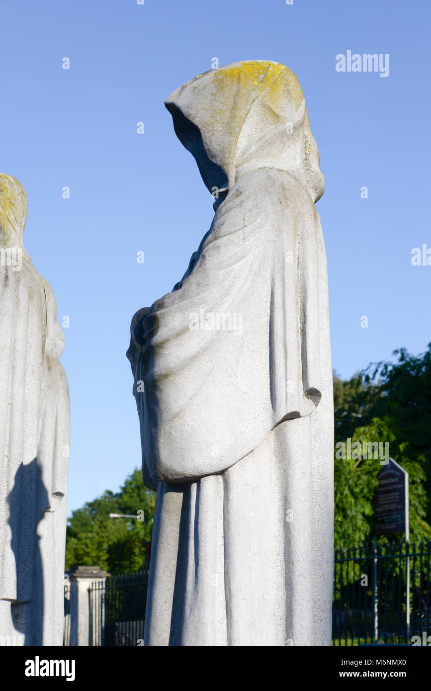 faceless monk statues at the town of fermoy in county cork ireland Stock Photo