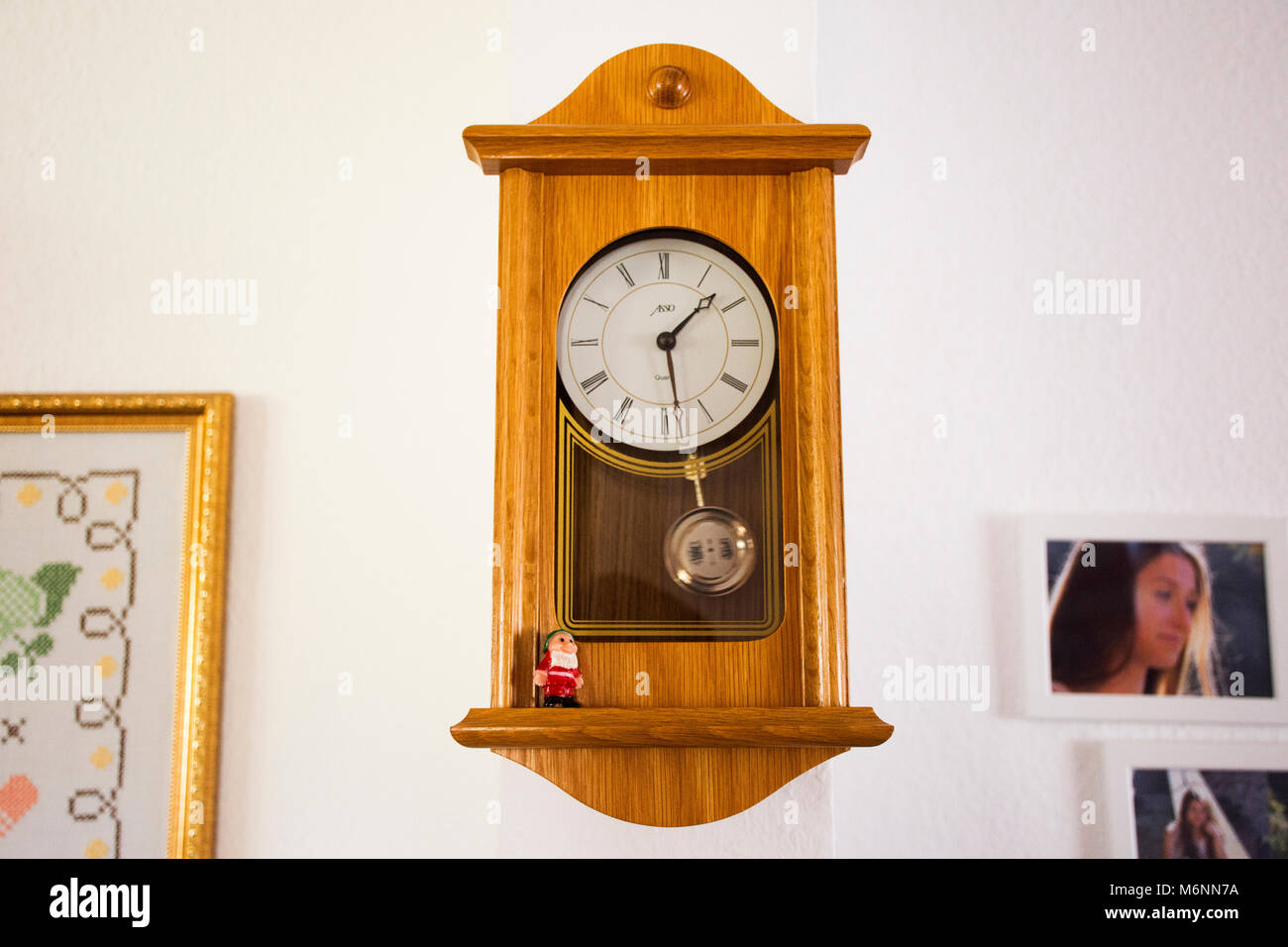 Wooden Classic clock germany style on wall in house on September 9