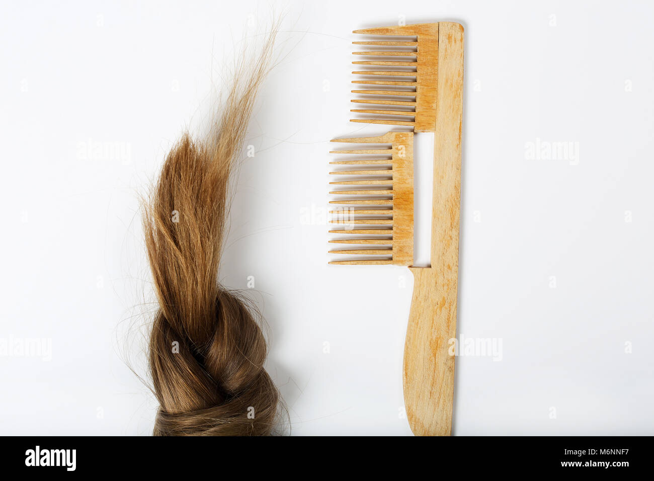 Hair and a broken hair brush. Top view Stock Photo Alamy