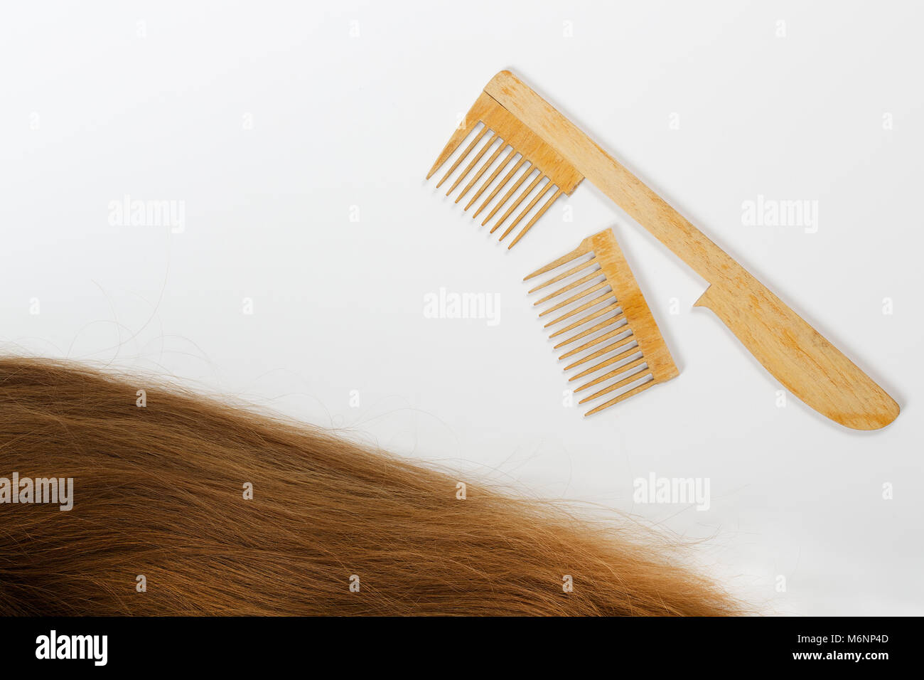 Hair and a broken hair brush. Top view Stock Photo Alamy