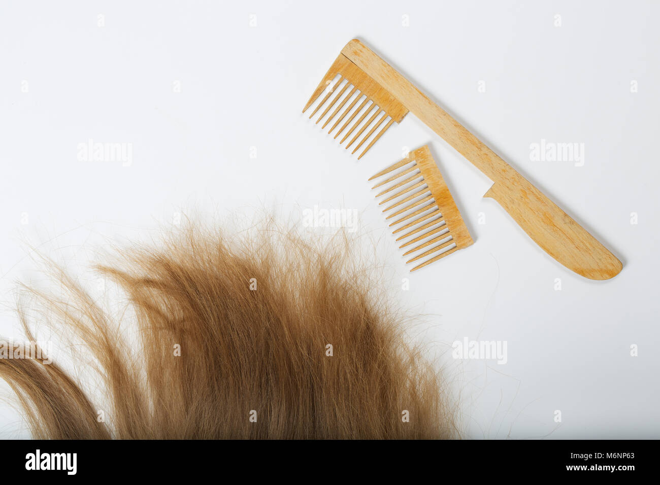 Hair and a broken hair brush. Top view Stock Photo Alamy