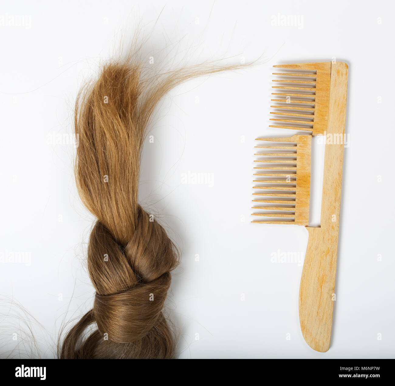 Hair and a broken hair brush. Top view Stock Photo Alamy