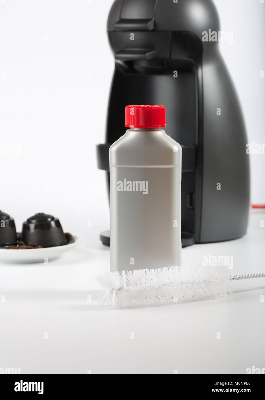 Coffee machine liquid limescale remover. Coffee capsules and coffee