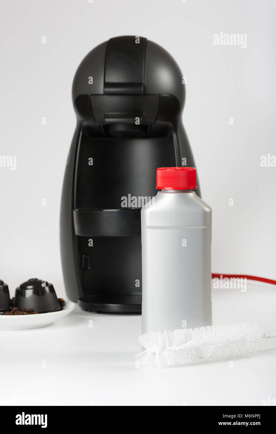 Coffee machine liquid limescale remover. Coffee capsules and coffee