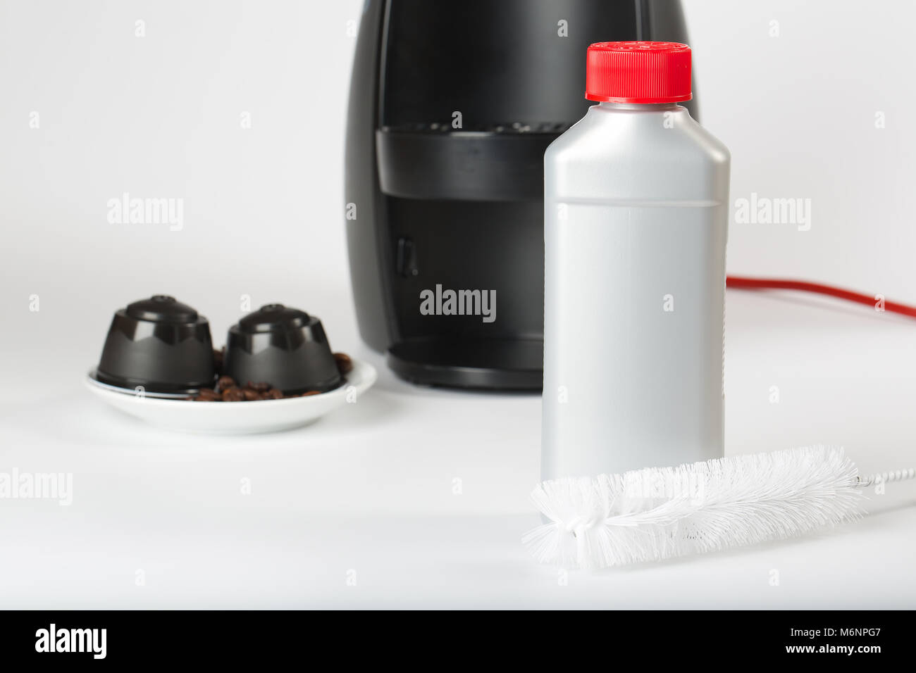 Coffee machine liquid limescale remover. Coffee capsules and coffee