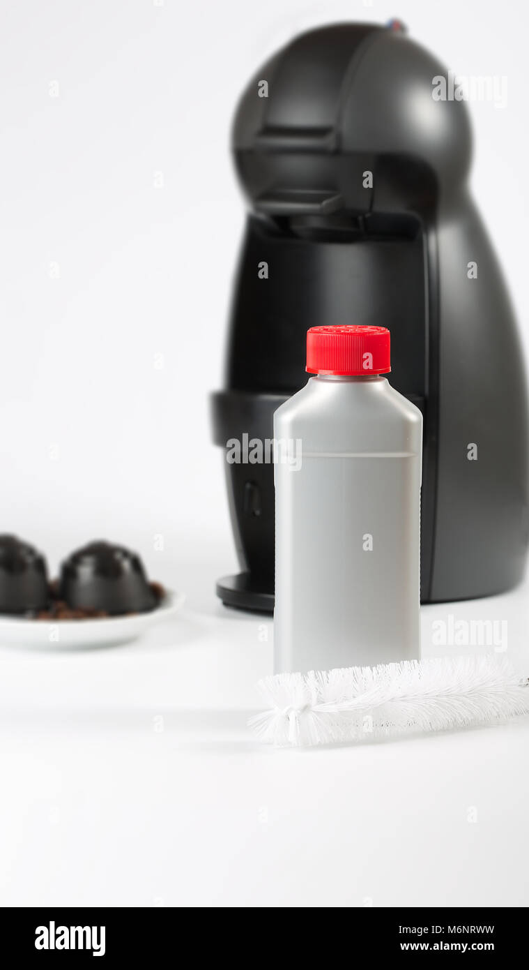 Coffee machine liquid limescale remover. Coffee capsules and coffee