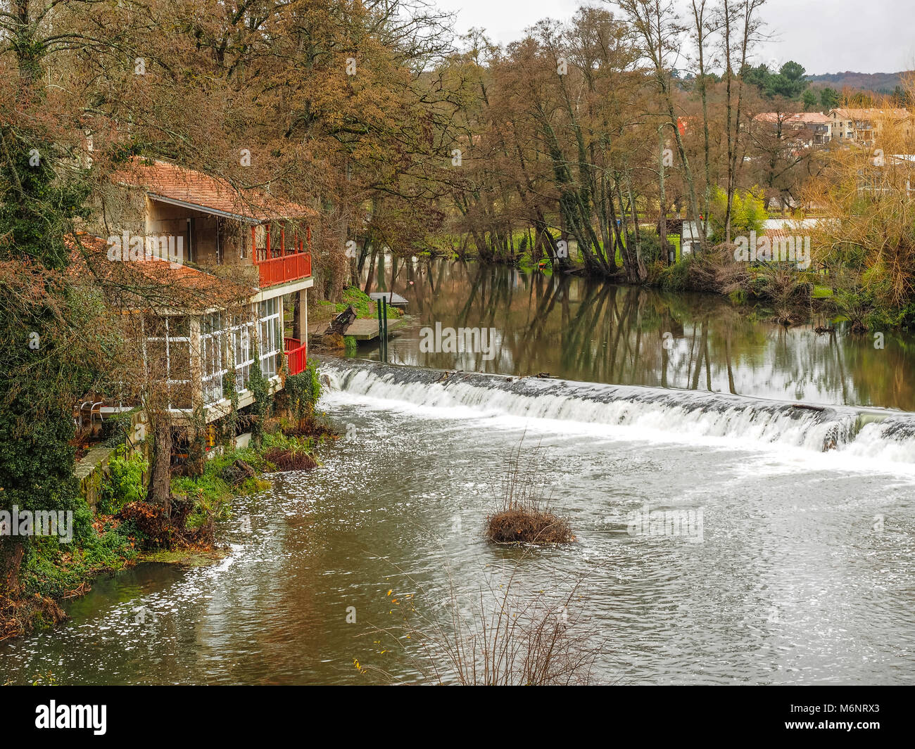 The river as it passes through the medieval village of Allariz in