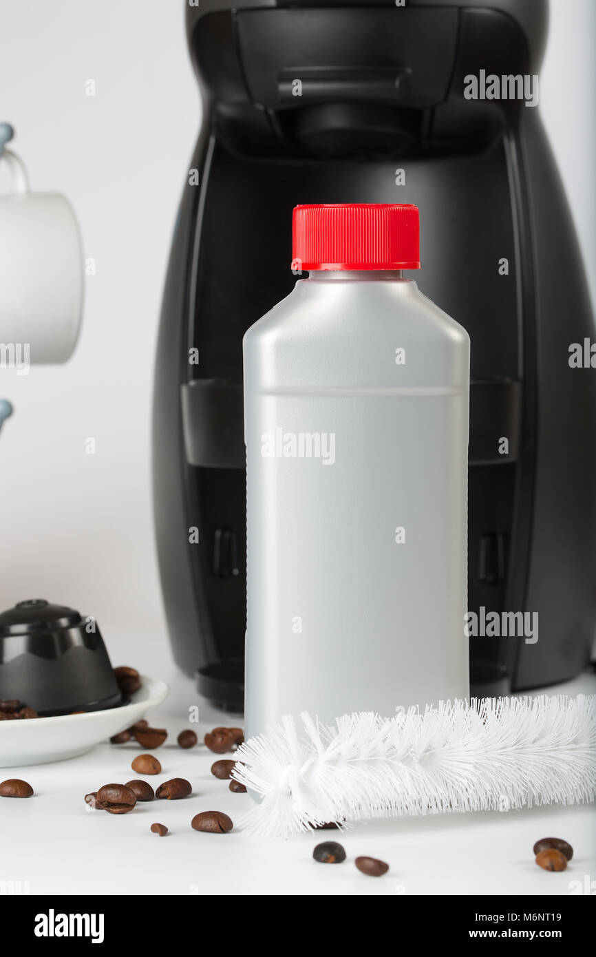 Coffee machine liquid limescale remover. Coffee capsules and coffee