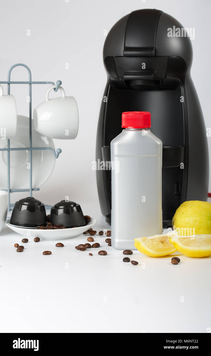 Coffee machine liquid limescale remover. Coffee capsules and coffee