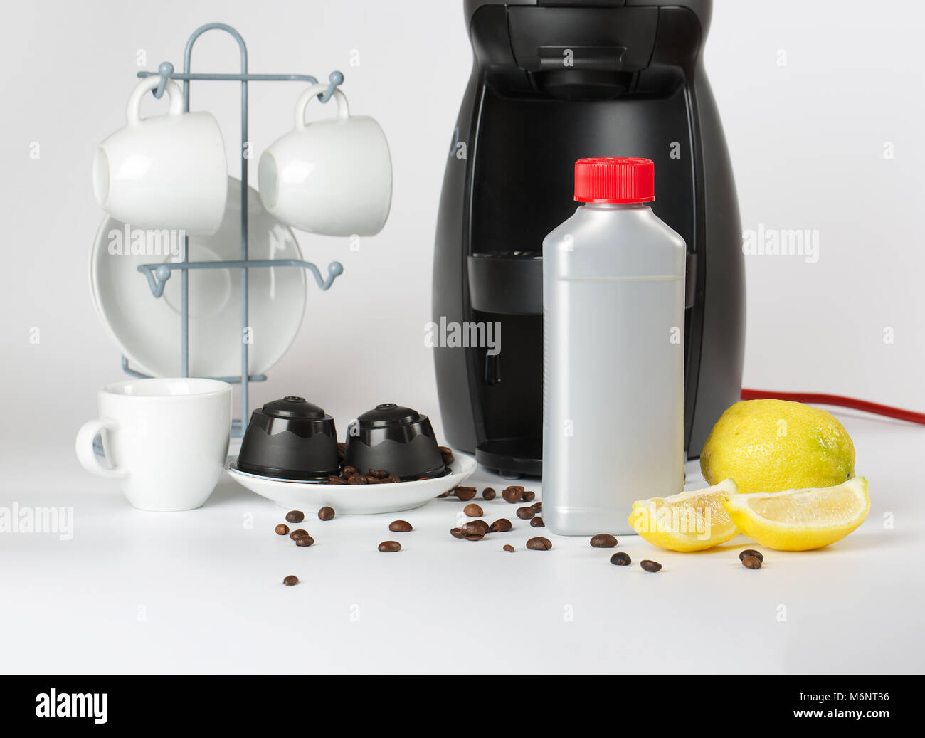 Coffee machine liquid limescale remover. Coffee capsules and coffee